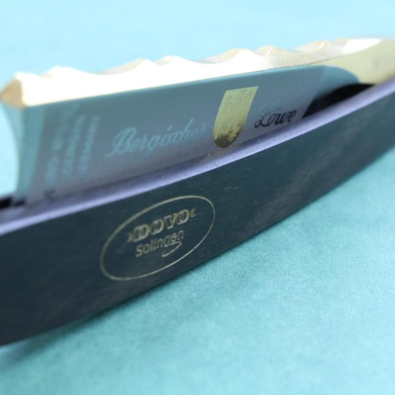 Dovo Bergischer Lowe with Ebony Scales