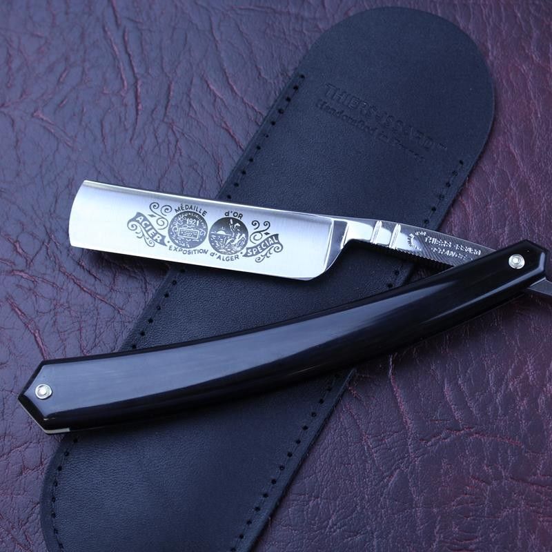 TI 5/8 Medaille D'or Razor with Black Horn scales