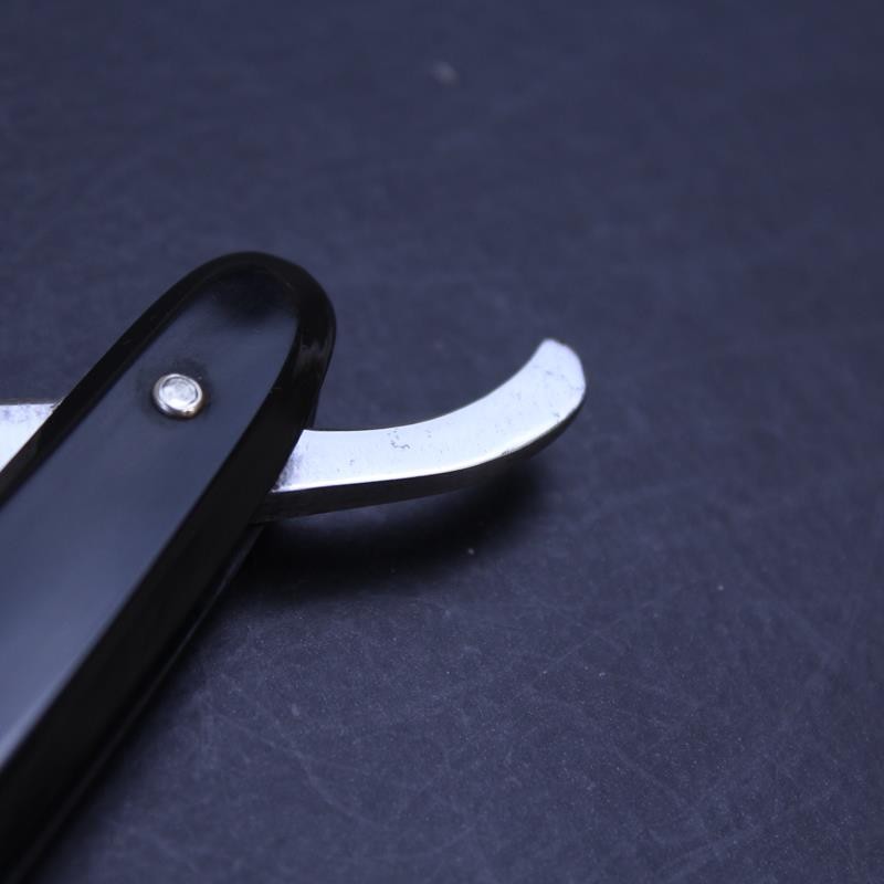 Vintage 6/8 Sprock Brand Razor