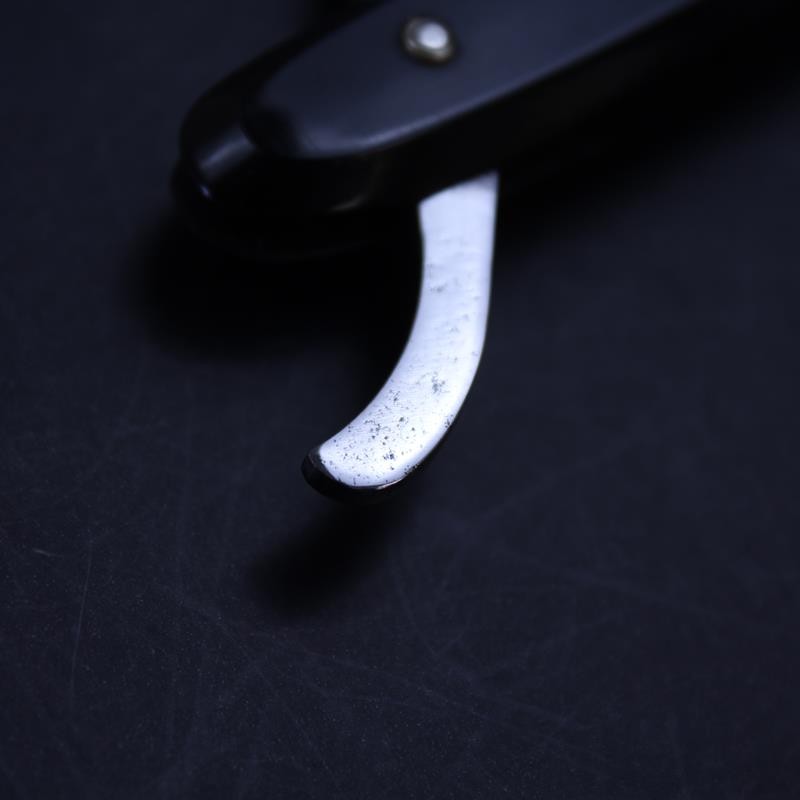 Vintage 6/8 Sprock Brand Razor