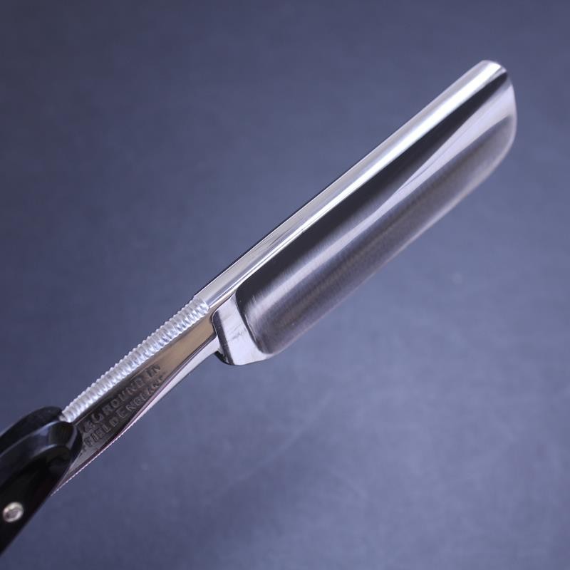 Vintage 6/8 Sprock Brand Razor