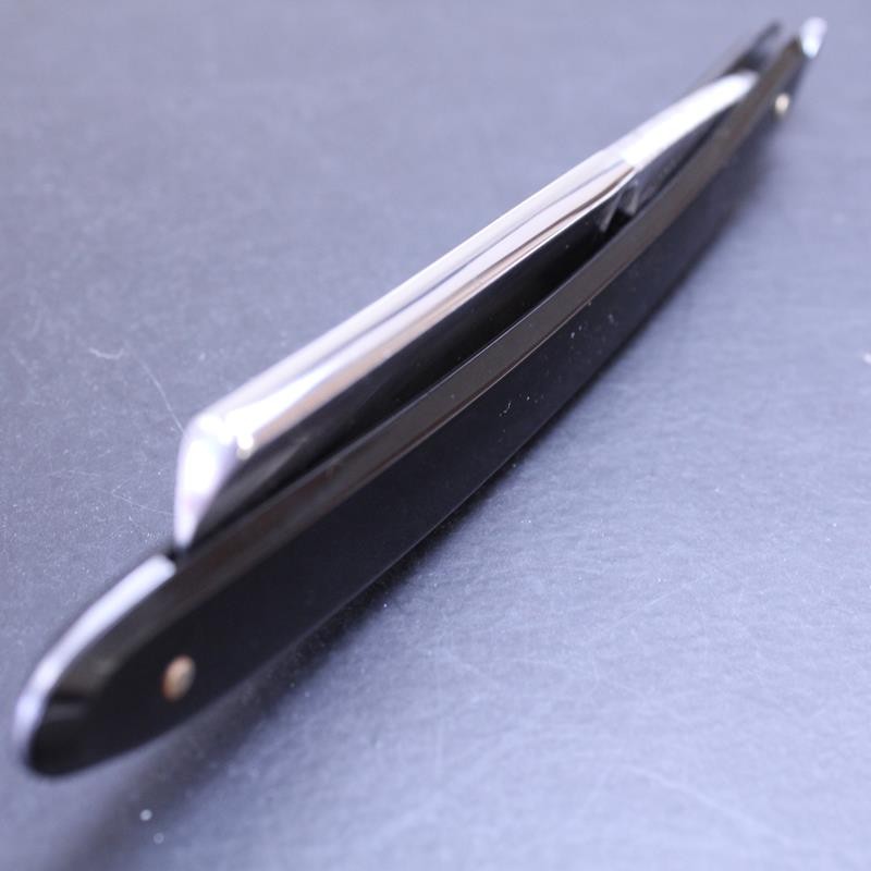 Vintage 6/8 Sprock Brand Razor